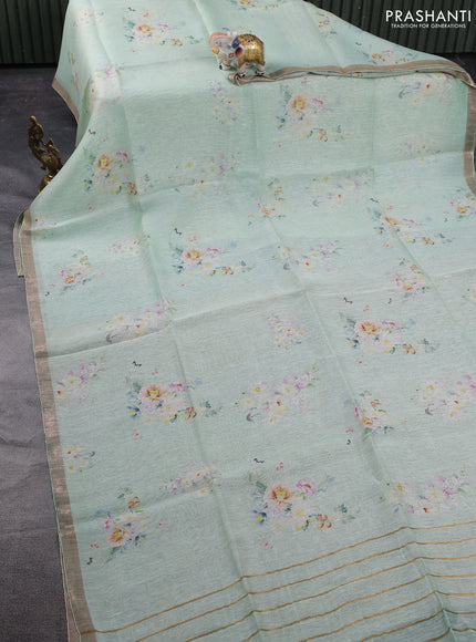 Pure linen silk saree teal shade and sandal with floral butta prints and small zari woven border