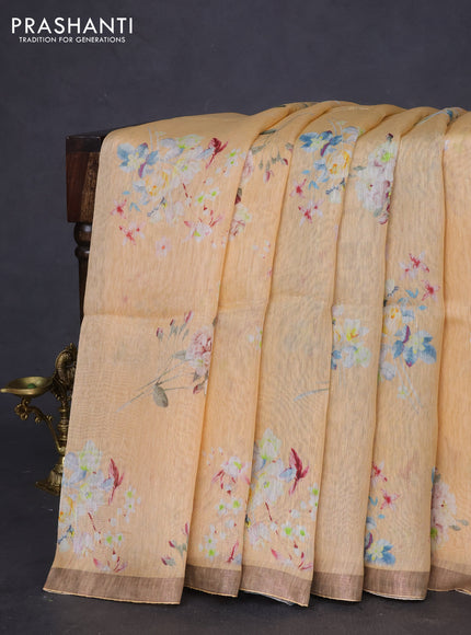 Pure linen silk saree sandal with floral butta prints and small zari woven border