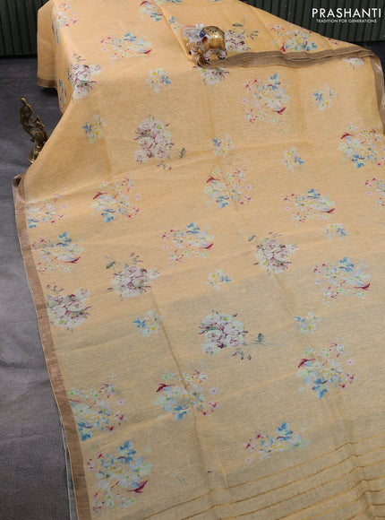 Pure linen silk saree sandal with floral butta prints and small zari woven border