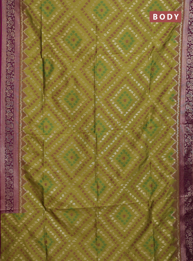 Semi soft silk saree mehendi green and purple with allover ikat & zari weaves and zari woven border
