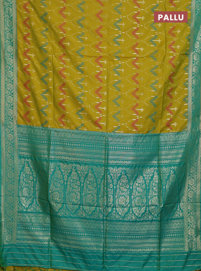 Semi soft silk saree dual shade of mustard and teal green with allover ikat & zari weaves and zari woven border