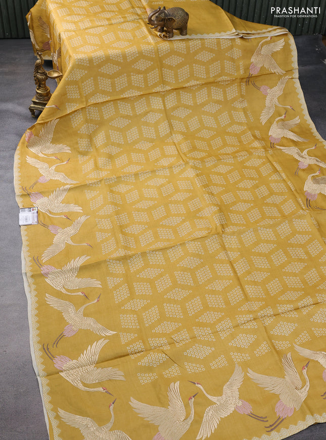 Pure tussar silk saree mustard shade with allover geometric prints and bird design embroidery work border