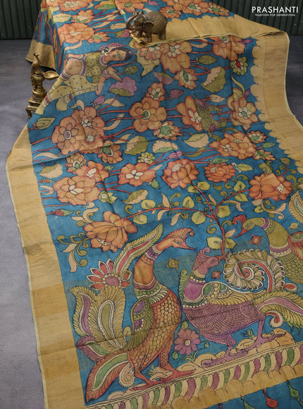 Pure tussar silk saree peacock green and mustard shade with allover penkalamkari prints and zari woven border