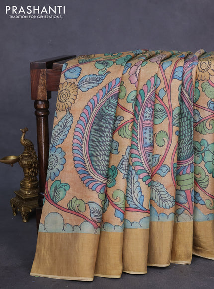 Pure tussar silk saree sandal and blue with allover penkalamkari prints and zari woven border