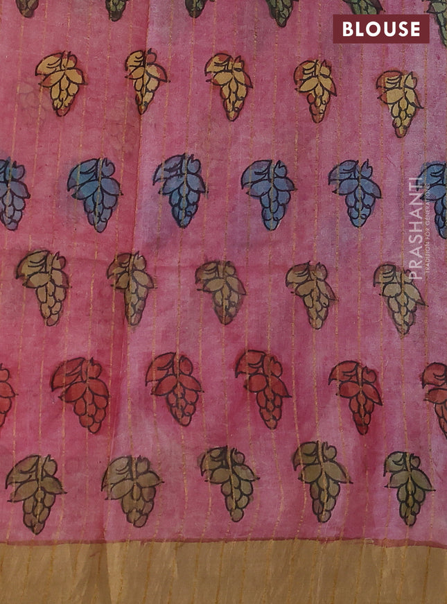 Pure tussar silk saree pastel pink and sandal with allover penkalamkari prints and zari woven border