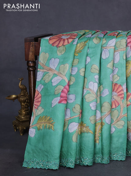 Pure tussar silk saree teal green shade with allover kalamkari prints and embroidery sequin work border