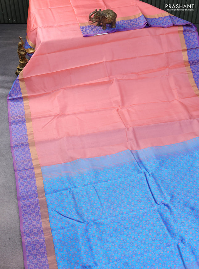 Pure kanchipuram silk saree peach shade and dual shade of blue with allover self emboss and thread & zari woven border
