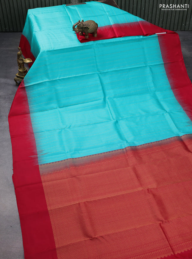 Pure kanchipuram silk saree teal green shade and redish pink with allover zari weaves and simple border