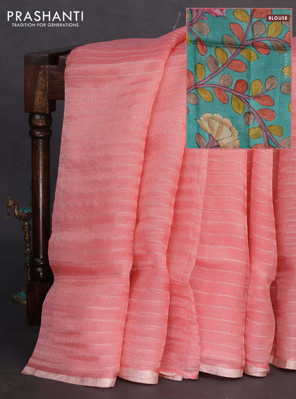 Pure organza silk saree light pink and mustard yellow with allover zari weaves and zari woven piping border & kalamkari printed blouse