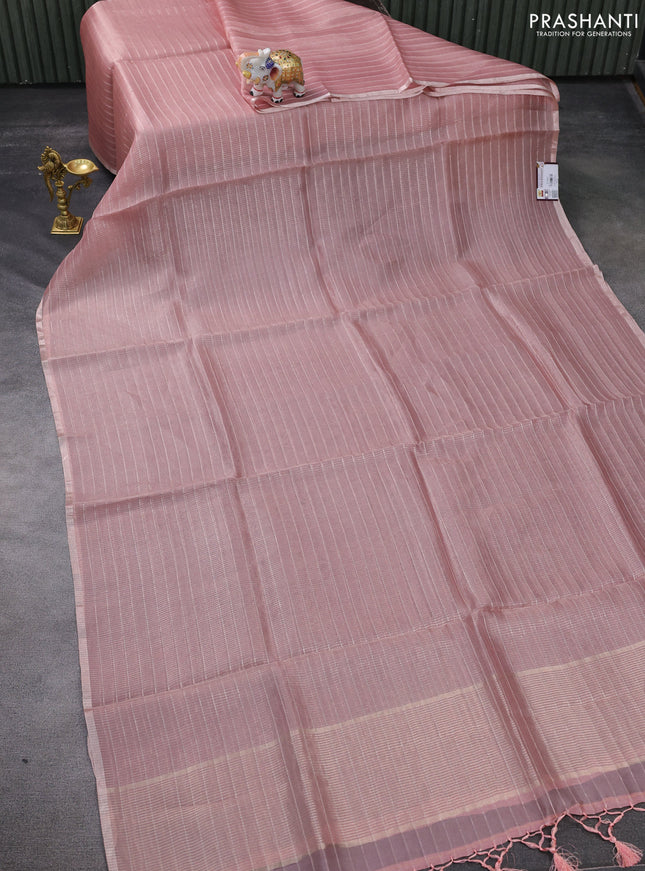 Pure organza silk saree peach pink shade and teal green shade with allover zari weaves and zari woven piping border & kalamkari pita work blouse