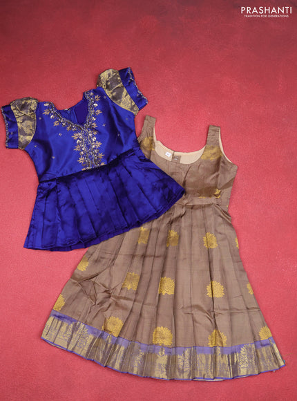 Silk kids lehenga blue and chikku shade with aari work neck pattern & puff sleeve and zari weaves & zari woven border