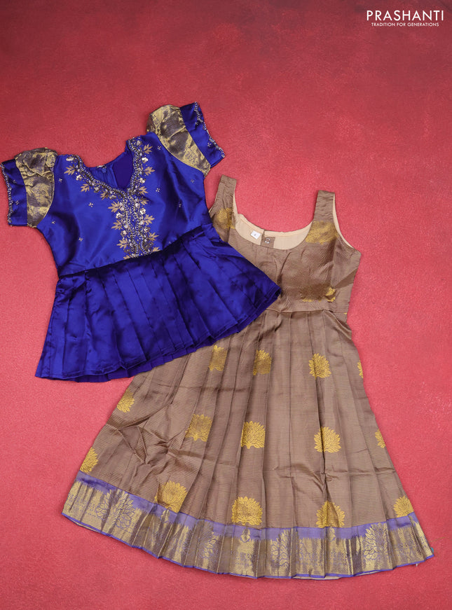 Silk kids lehenga blue and chikku shade with aari work neck pattern & puff sleeve and zari weaves & zari woven border