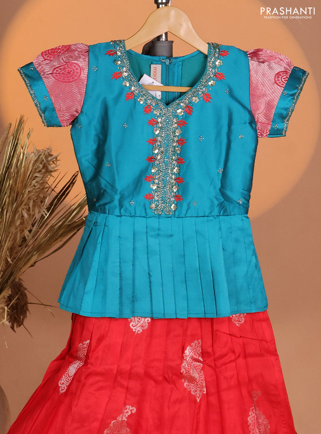 Silk kids lehenga teal blue and orange with aari work neck pattern & puff sleeve and silver zari buttas & zari woven border