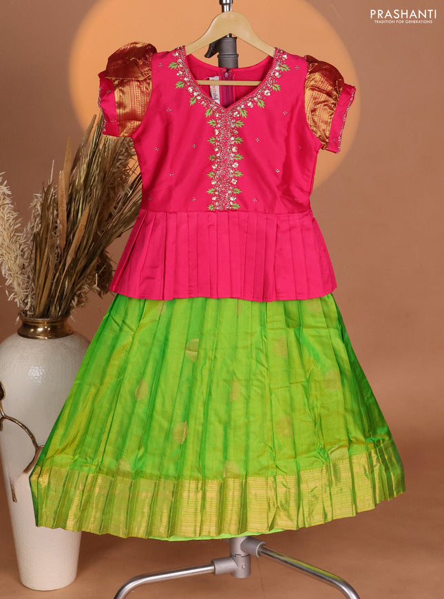Silk kids lehenga pink and light green with aari work neck pattern & puff sleeve and self emboss zari buttas & zari woven border