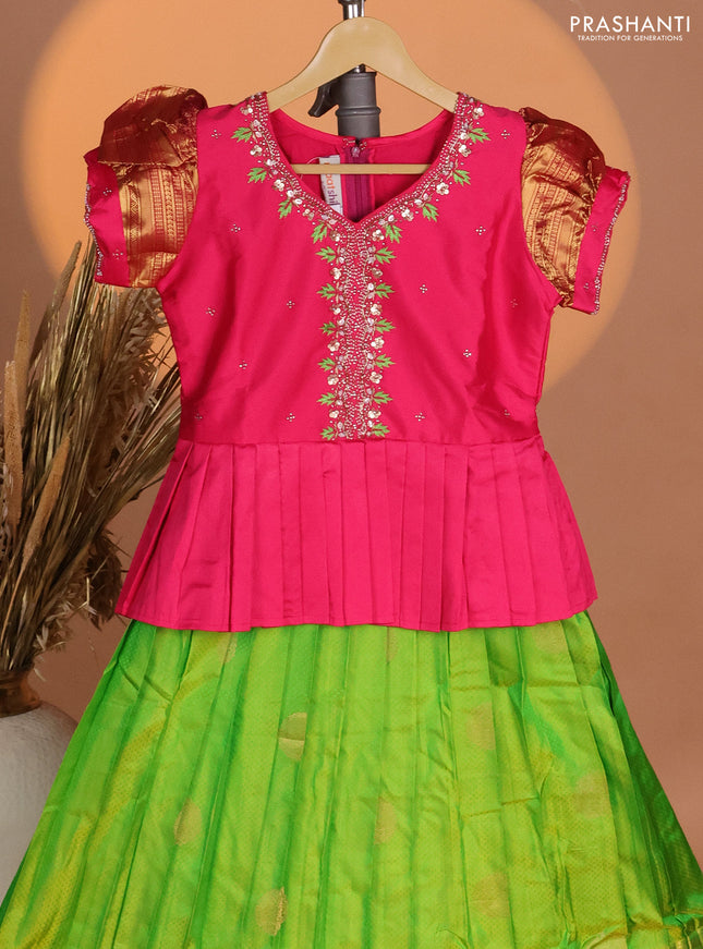 Silk kids lehenga pink and light green with aari work neck pattern & puff sleeve and self emboss zari buttas & zari woven border