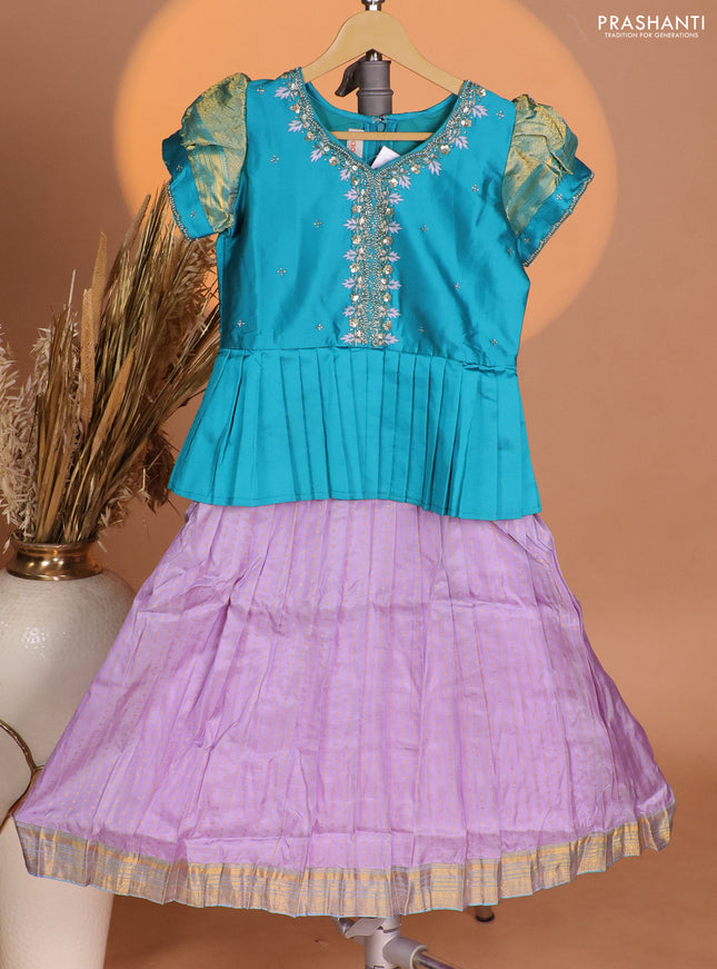 Silk kids lehenga teal blue shade and lavender with aari work neck pattern & puff sleeve and allover zari buttas & zari woven border