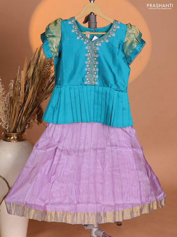 Silk kids lehenga teal blue shade and lavender with aari work neck pattern & puff sleeve and allover zari buttas & zari woven border