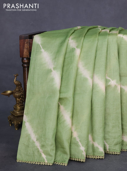 Pure tussar silk saree pastel green and rust shade with allover tie & dye prints and kalamkari prints & cut work pallu