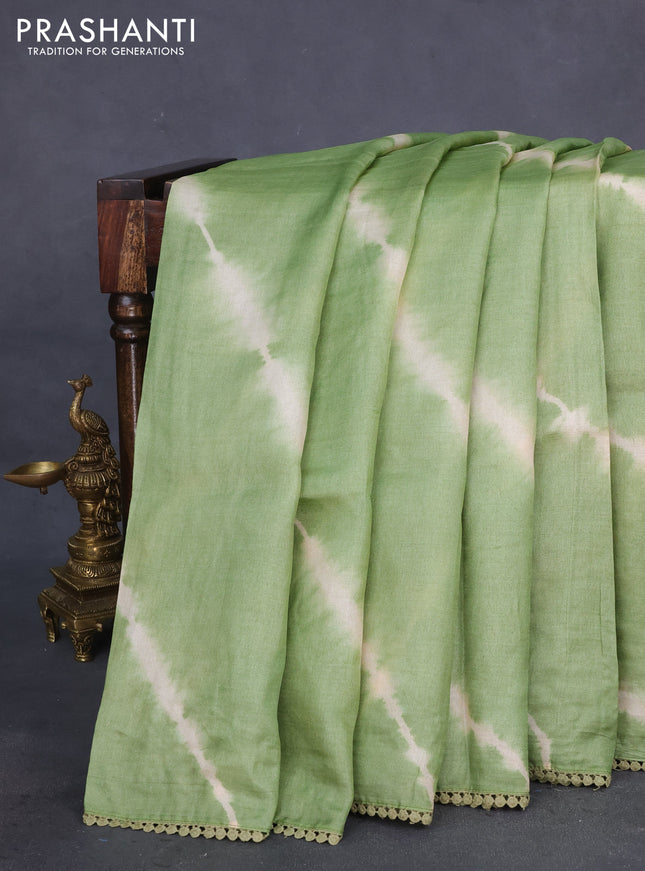 Pure tussar silk saree pastel green and rust shade with allover tie & dye prints and kalamkari prints & cut work pallu