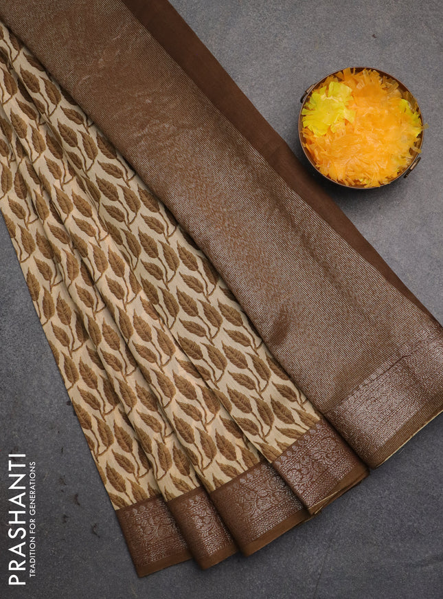 Chanderi silk cotton saree cream and mehendi green with allover leaf prints and banarsi style border