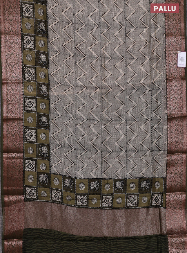 Chanderi silk cotton saree beige and sap green with allover prints and banarsi style border
