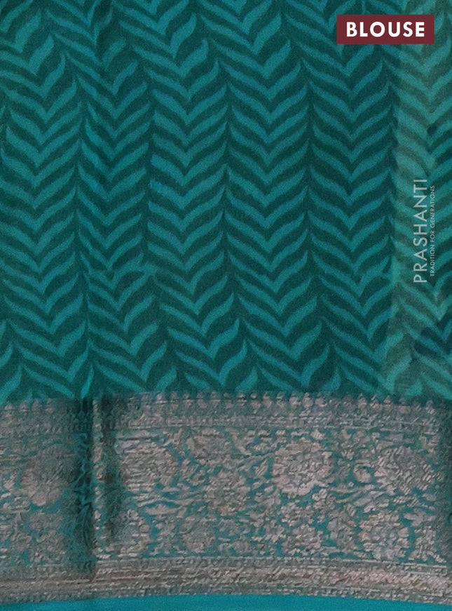 Chanderi silk cotton saree sap green shade and teal blue witha allover prints and banarasi style border