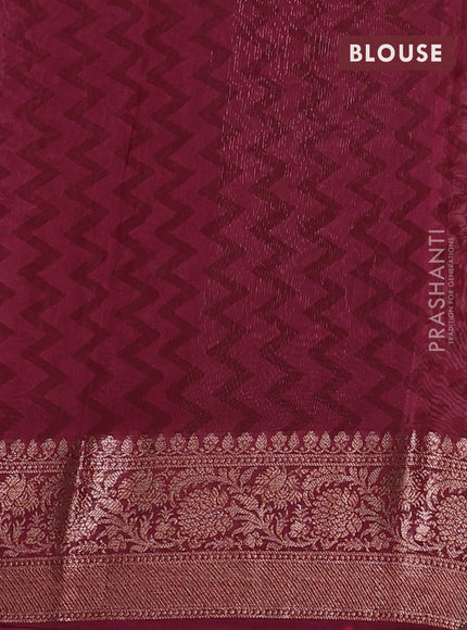 Chanderi silk cotton saree pastel peach shade and maroon with allover prints and banarsi style border