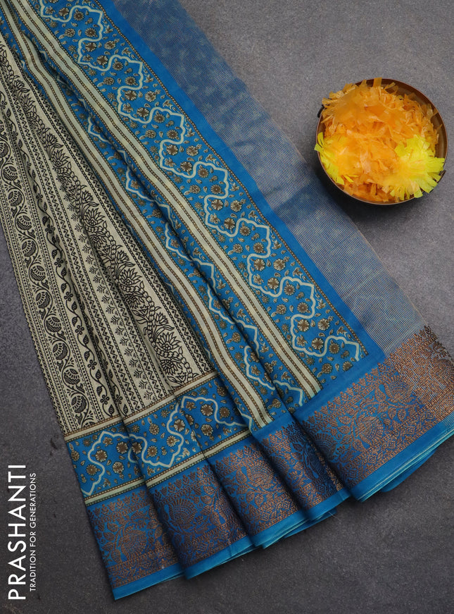 Chanderi silk cotton saree cream and cs blue with allover prints and banarsi style border