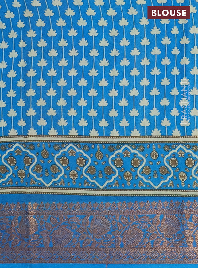 Chanderi silk cotton saree cream and cs blue with allover prints and banarsi style border