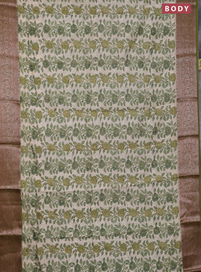 Chanderi silk cotton saree cream and mehendi green with allover floral prints and banarsi style border