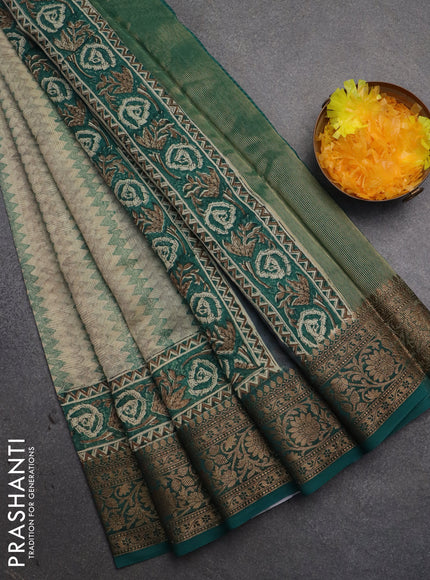 Chanderi silk cotton saree cream and teal green with allover zig zag prints and printed banarasi style border