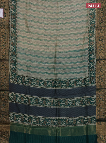 Chanderi silk cotton saree cream and teal green with allover zig zag prints and printed banarasi style border