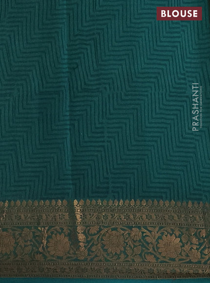 Chanderi silk cotton saree cream and teal green with allover zig zag prints and printed banarasi style border