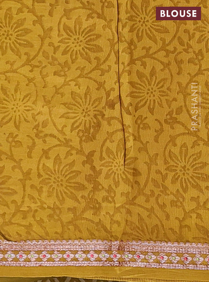 Chanderi silk cotton saree lime green with allover prints and banarasi style border