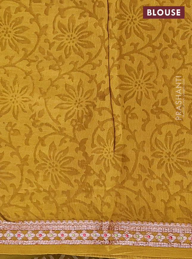 Chanderi silk cotton saree lime green with allover prints and banarasi style border