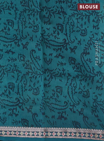 Chanderi silk cotton saree beige and peacock green with allover geometric prints and banarasi style border