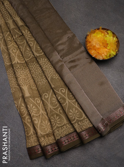 Chanderi silk cotton saree sandal and sap green with allover prints and banarasi style border