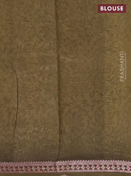 Chanderi silk cotton saree sandal and sap green with allover prints and banarasi style border