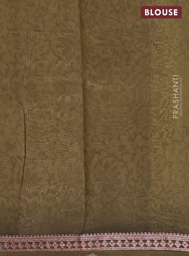 Chanderi silk cotton saree sandal and sap green with allover prints and banarasi style border