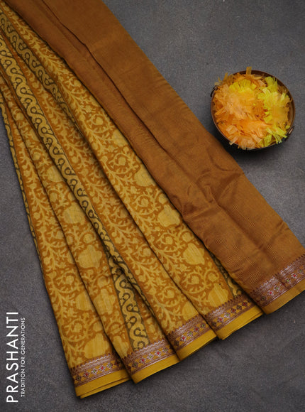 Chanderi silk cotton saree mustard yellow with allover prints and banarasi style border