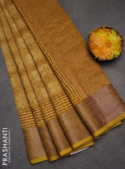 Chanderi silk cotton saree pale yellow and mustard yellow with allover prints and banarasi style border