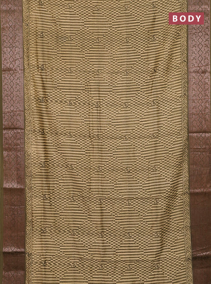 Chanderi silk cotton saree beige and mehendi green with allover prints and banarasi style border