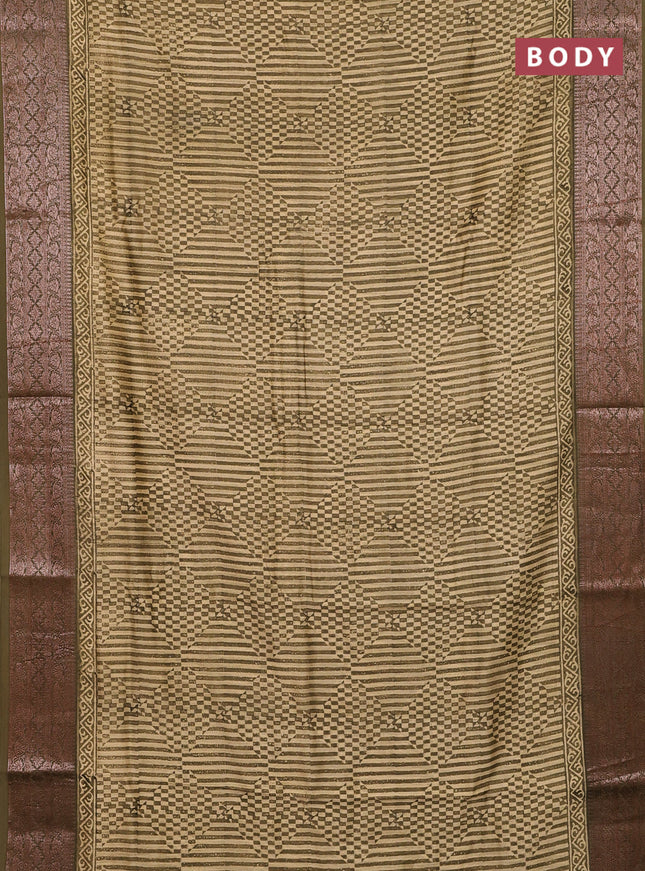 Chanderi silk cotton saree beige and mehendi green with allover prints and banarasi style border