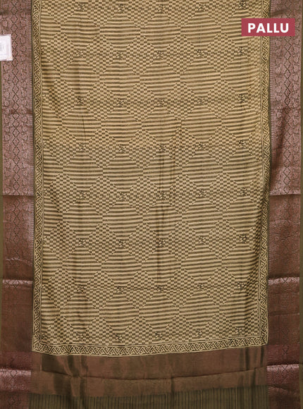 Chanderi silk cotton saree beige and mehendi green with allover prints and banarasi style border