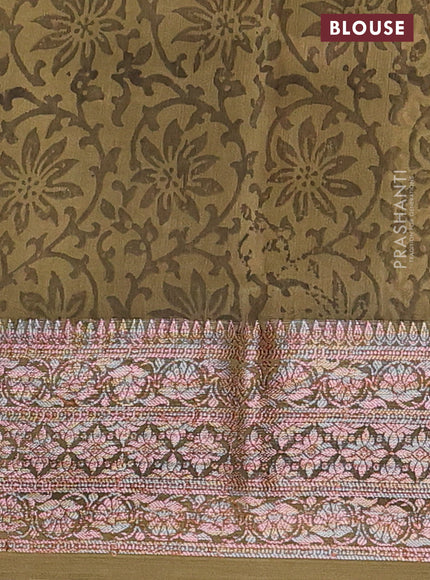 Chanderi silk cotton saree beige and mehendi green with allover prints and banarasi style border