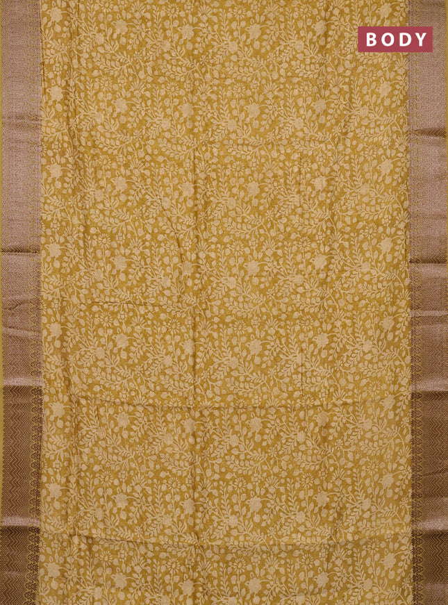 Chanderi silk cotton saree mustard shade with allover floral prints and banarasi style border