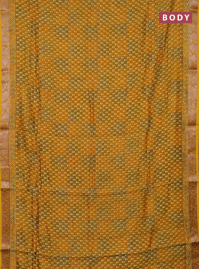 Chanderi silk cotton saree mustard yellow with allover butta prints and banarasi style border