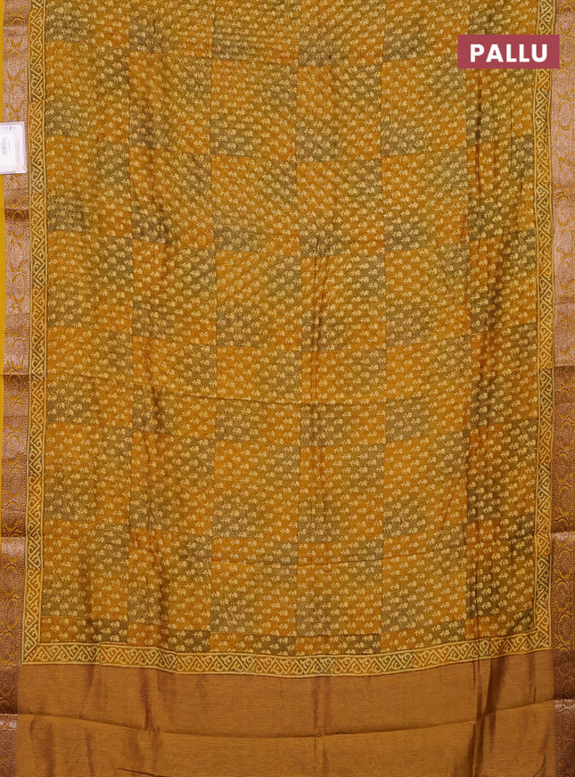 Chanderi silk cotton saree mustard yellow with allover butta prints and banarasi style border