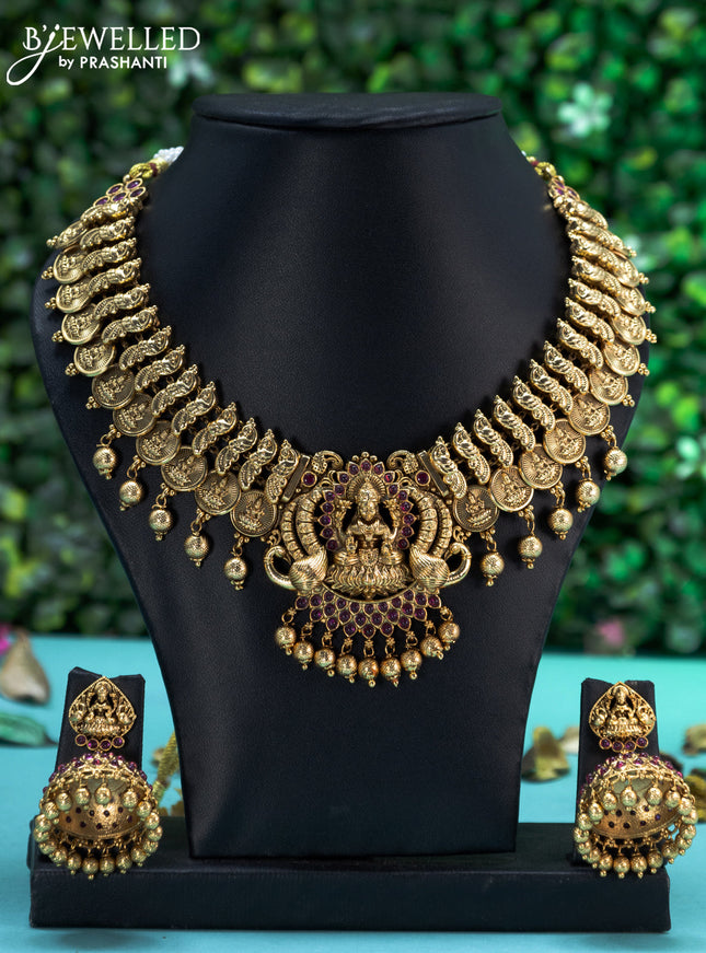 Antique necklace lakshmi kasu design with pink kemp stones and golden beads hangings