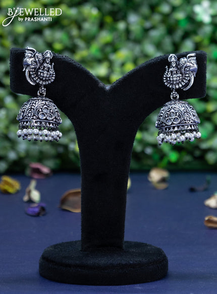 Oxidised jhumka lakshmi design with cz stones and pearl hangings